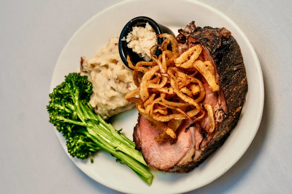 Prime rib served with mashed potatoes and broccolini during Father's Day brunch at Bascom's Chop House in Clearwater FL