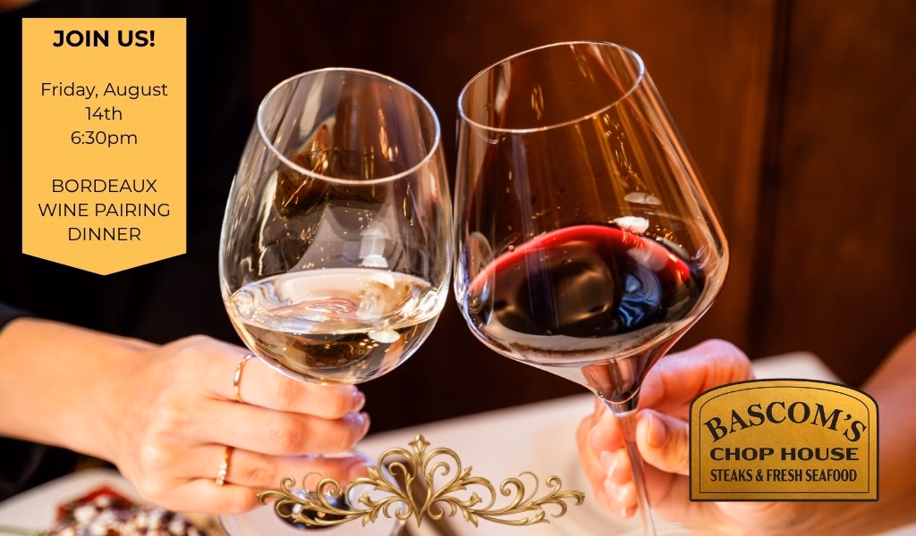 Guests enjoying red and white Bordeaux wines during a wine pairing dinner at Bascom's Chop House in Clearwater FL