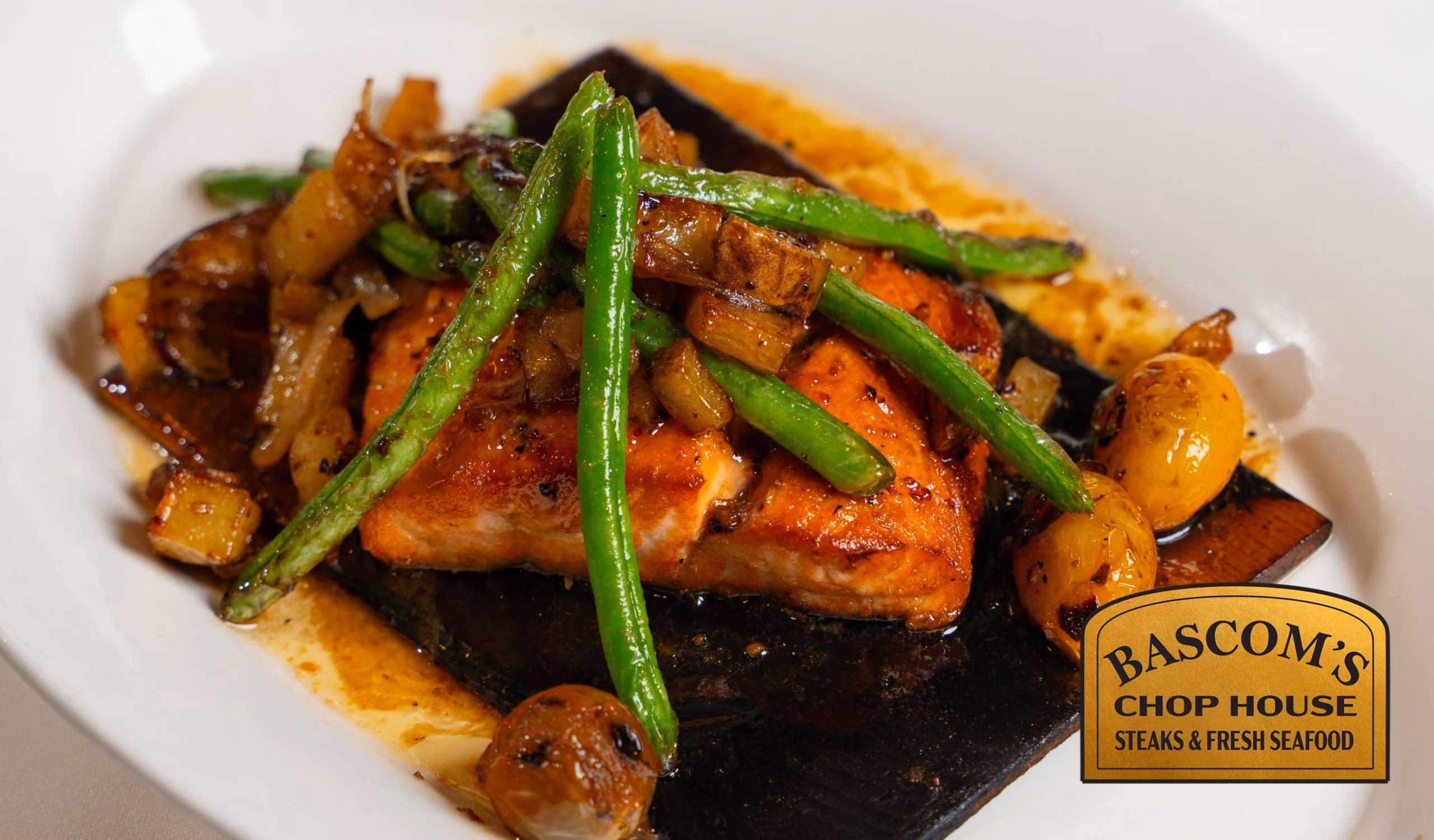 Cedar plank salmon with roasted vegetables at Bascom’s Chop House in Clearwater