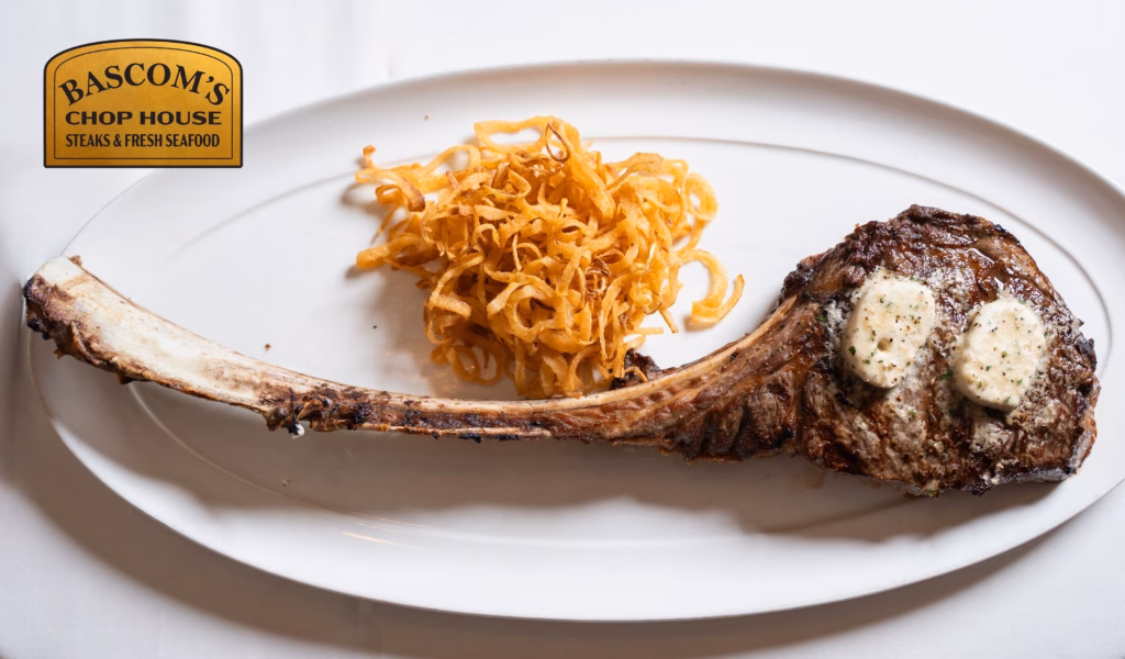 Tomahawk ribeye with compound butter and crispy onions at Bascom’s Chop House in Clearwater
