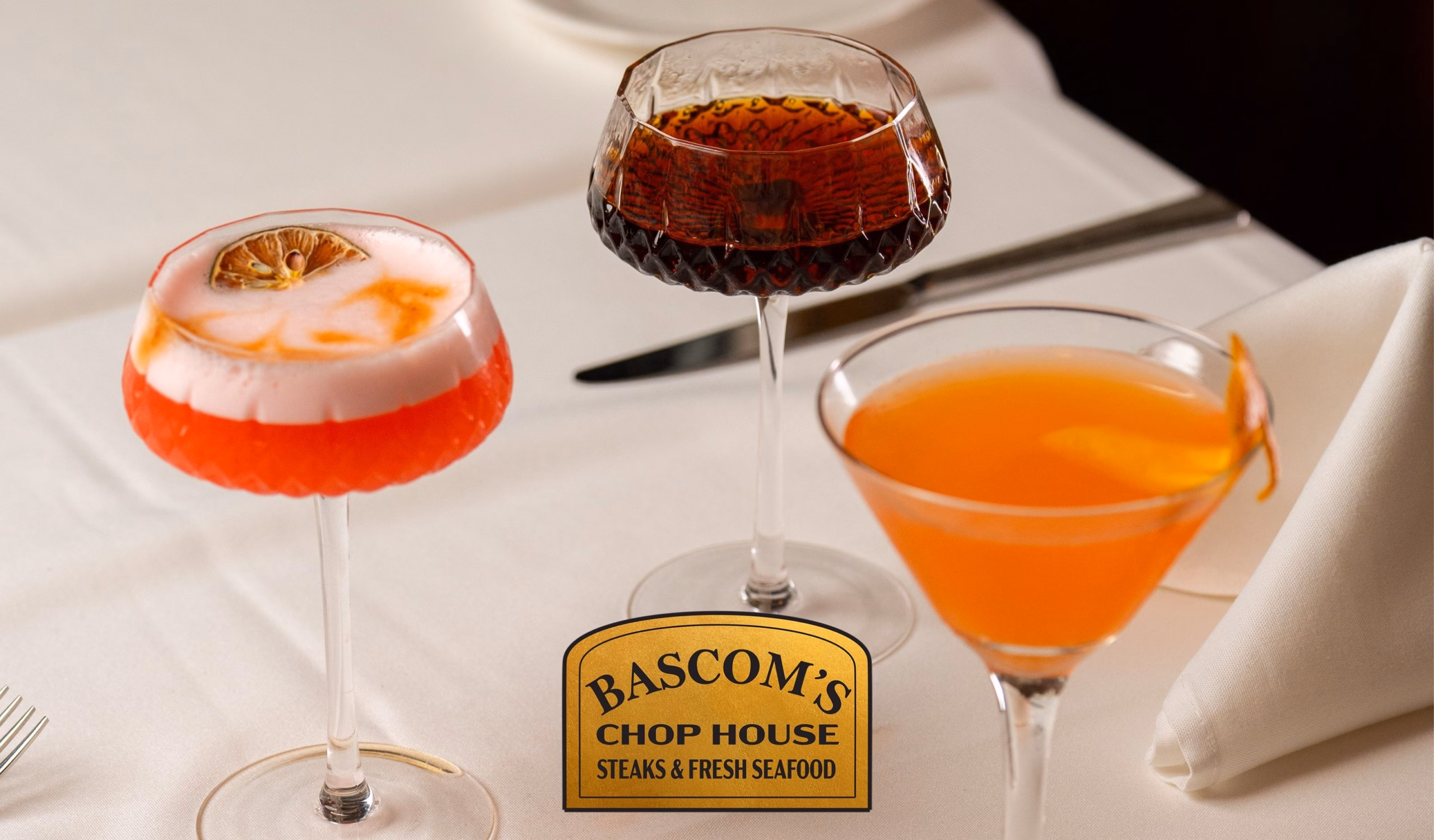 Three cocktails and and Non-Alcoholic Drinks on a table at Bascom’s Chop House in Clearwater