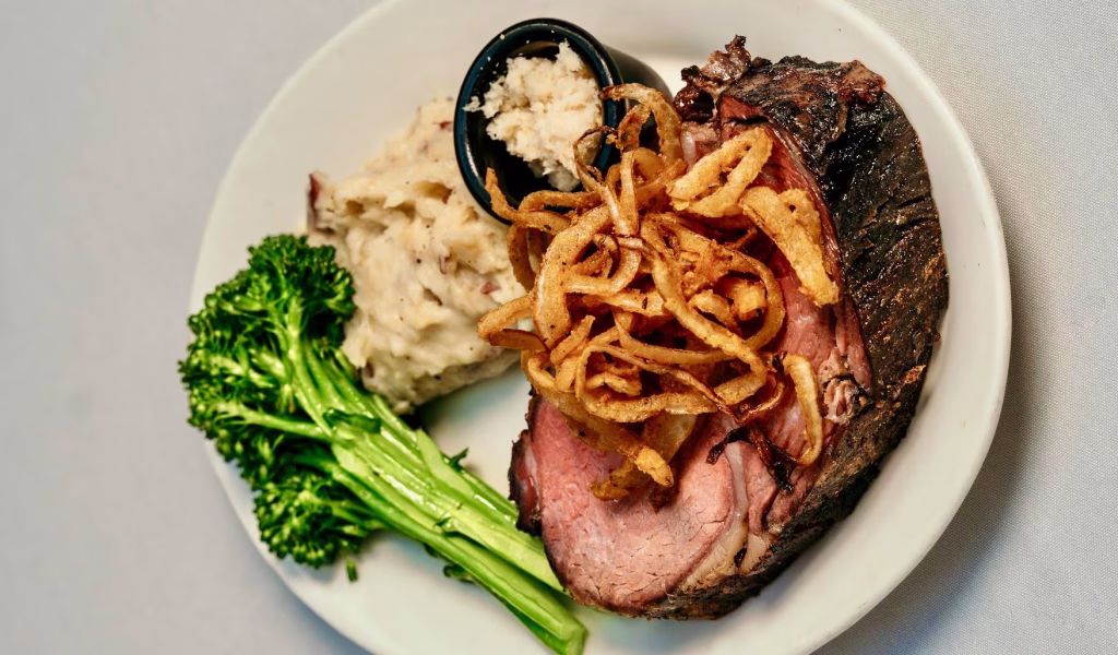 Prime rib served with mashed potatoes and broccolini during Father's Day brunch at Bascom's Chop House in Clearwater FL